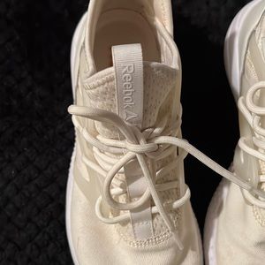White and cream Woman’s running shoes